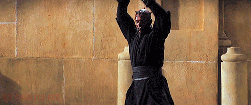 Darth Maul igniting his lightsaber